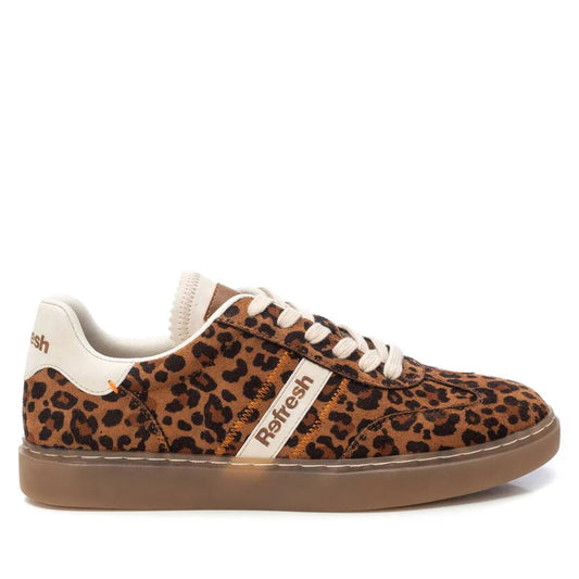 A brown trainer with a leopard print pattern, beige laces, and a translucent brown sole. Crafted from vegan fabric, it features an adjustable lace-up fastening. The Refresh brand name appears on the side and heel.