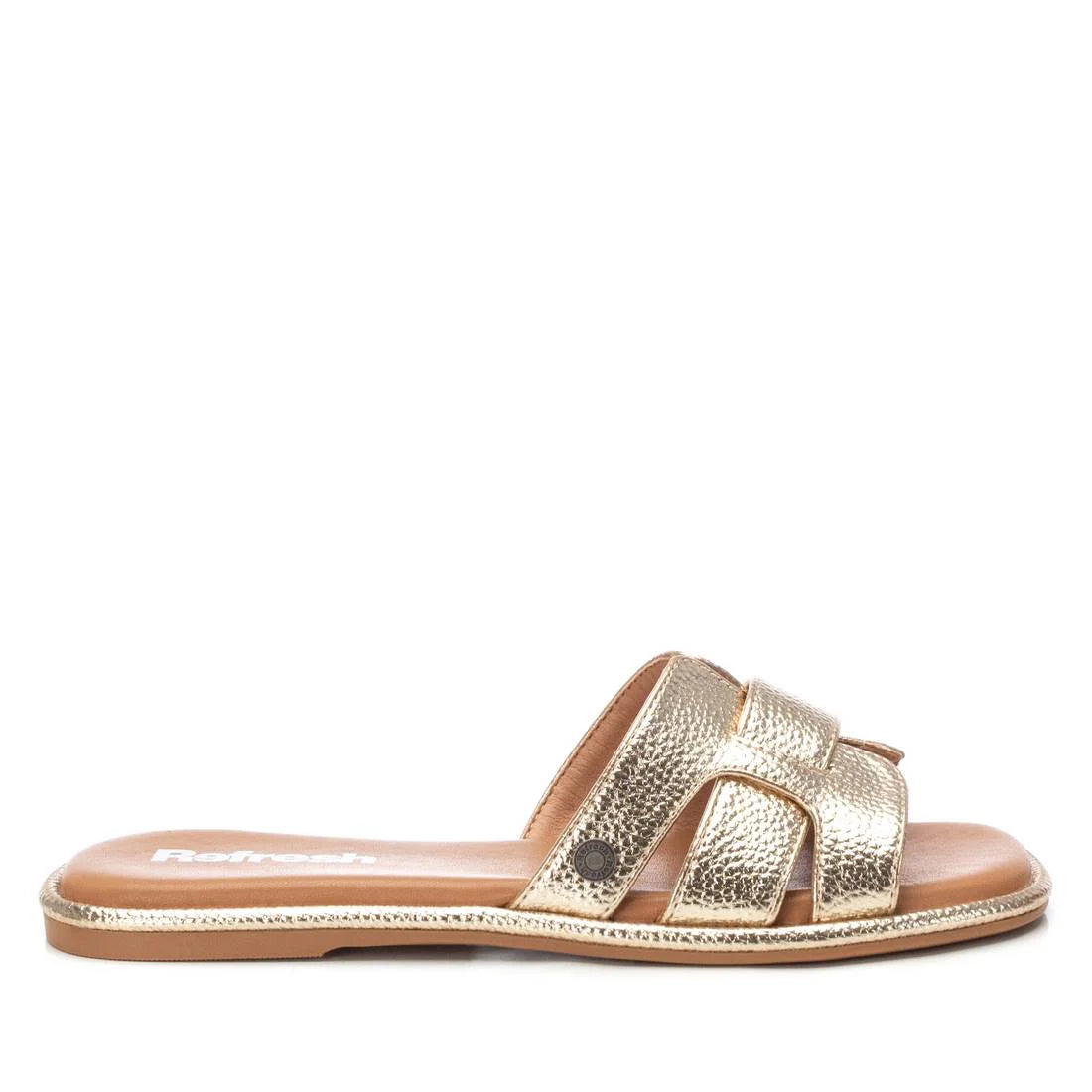 A gold metallic flat slide sandal with a textured finish, open toe, and three cut-out straps across the upper—an elegant choice among gold womens sandals.