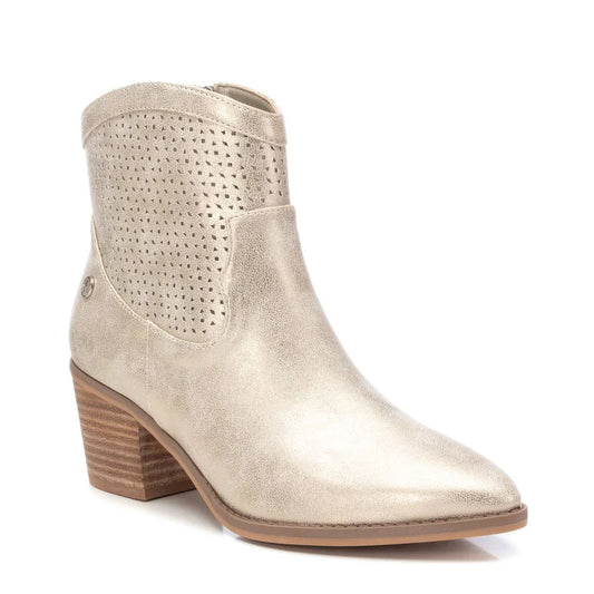 A metallic sheen ankle boot with a low block heel, perforated upper section, pointed toe, and side zip, displayed against a white background.