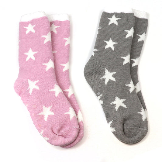 Two pairs of cosy socks, one pink and one grey with white stars, are placed side by side on a white background. These vegan socks are ideal for keeping your feet warm and stylish.