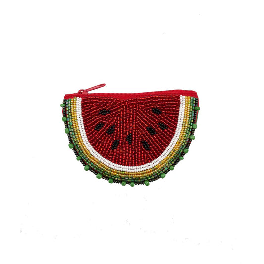 A small, half-moon Watermelon Purse styled to resemble a beaded watermelon slice, featuring a red zip at the top—a playful, vegan-friendly accessory ideal for summery fashion.