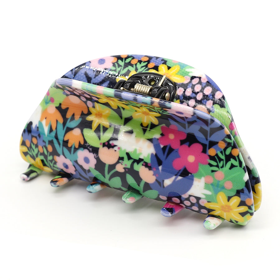 Luxury hair accessory: a floral-patterned hair claw clip crafted from premium acrylic, featuring multicoloured flowers and a sturdy metal spring hinge, elegantly displayed against a neutral background.