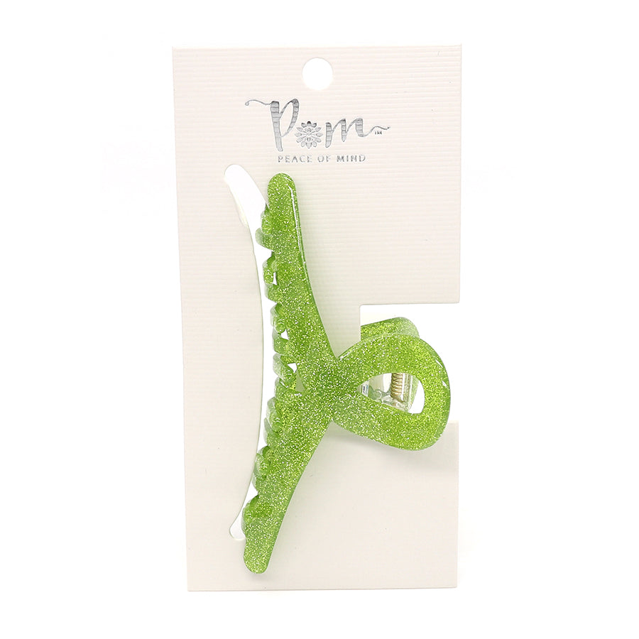 Vibrant lime glitter hair accessory on white packaging labelled Peace of Mind.