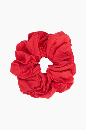 Experience the elegance of the Dakota Large Scrunchie, presented in vivid red against a pristine white backdrop.