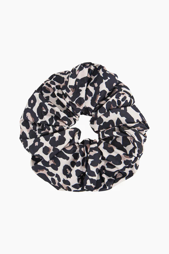Introducing the exclusive Dakota Large Neutral Leopard Hair Scrunchie, elegantly displayed against a pristine white backdrop.