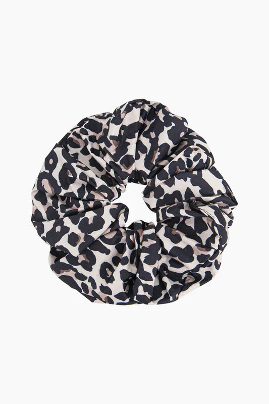 Introducing the exclusive Dakota Large Neutral Leopard Hair Scrunchie, elegantly displayed against a pristine white backdrop.