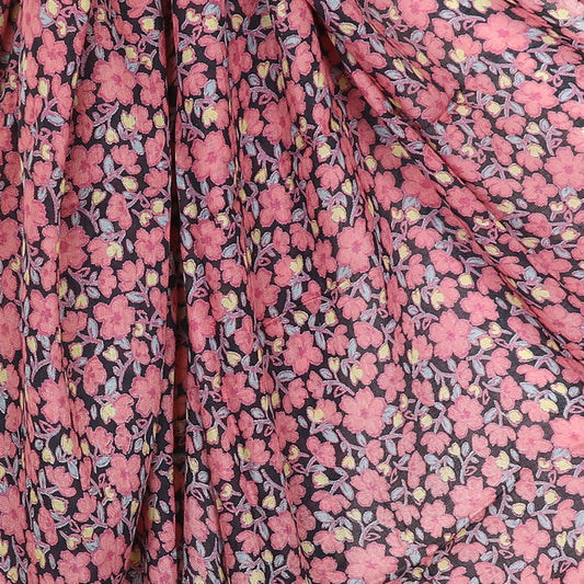 Close-up of an elegant floral scarf featuring a Pink Mix Floral Jasmine Print with vibrant flowers on a dark background.