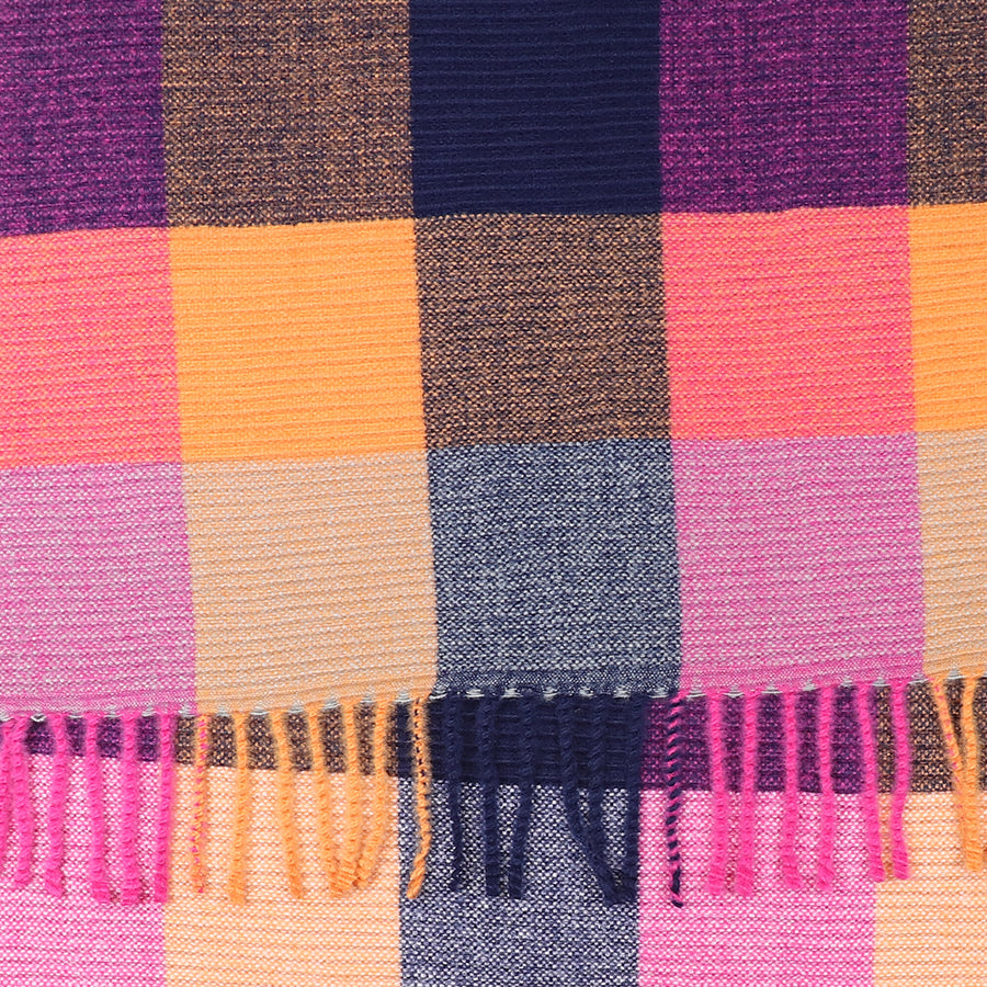 Close-up of a woven crinkle check scarf in navy blue, orange, pink, and purple with fringed tassels—ideal as a stylish accessory for any outfit.