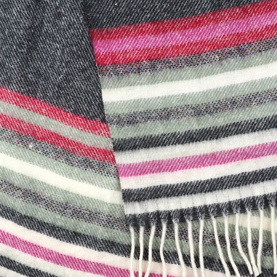 A close-up of a striped scarf woven with horizontal bands in black, red, pink, green, and white, featuring fringe along the bottom edge.
