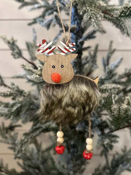 A fluffy hanging reindeer ornament with faux fur, a red nose, striped antlers, and beaded dangling legs makes a delightful Christmas tree decoration for your festive décor.