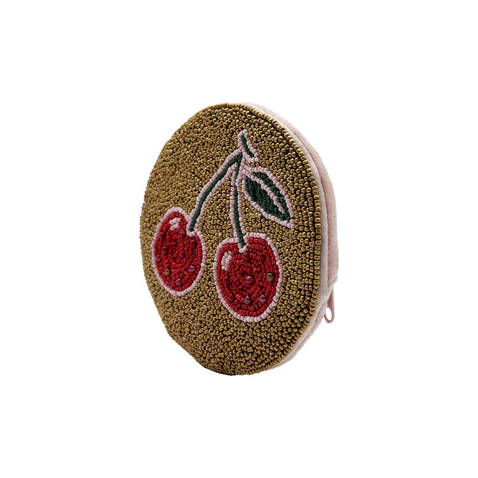 Round cherry coin purse featuring a beaded cherry motif and green leaves on a gold background—a delightful vegan accessory that's ideal as a Christmas present.