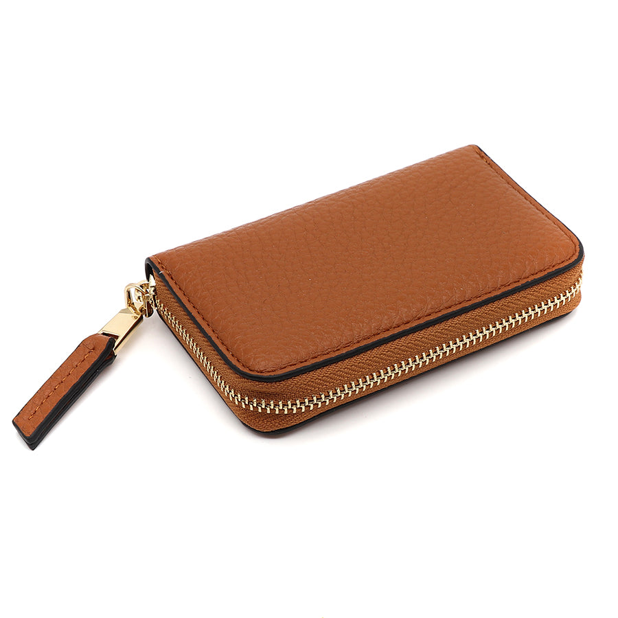 Brown leather zipped wallet with a gold-toned zip and pull tab, shown closed against a white background—ideal for pairing with your favourite quilted make-up bag.