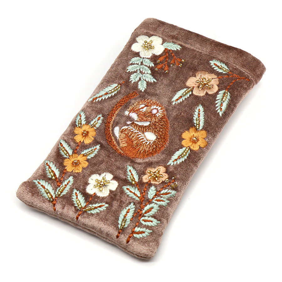 A taupe velvet glasses case adorned with embroidered flowers and leaves, featuring a curled-up sleeping mouse at the centre—ideal for protecting spectacles.