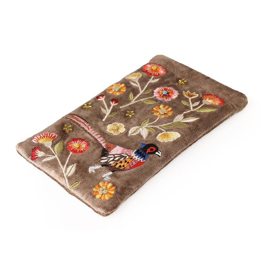 Brown rectangular embroidered glasses case adorned with colourful flowers and a bird, shown against a white background.