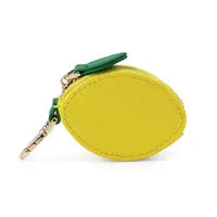 A small, yellow, lemon-shaped faux leather mini purse with a green zip and a convenient keyring clip attachment.