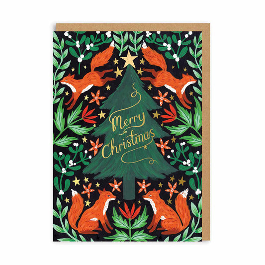 Illustrated fox Christmas card with a decorated tree bearing the words 'Merry Christmas', surrounded by four foxes, green leaves, red flowers, and gold stars—a delightful woodland festive card.