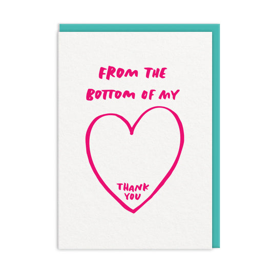 A6 handcrafted greetings card featuring pink text From the bottom of my heart above a pink heart with Thank you, all set against a white background with a teal border.