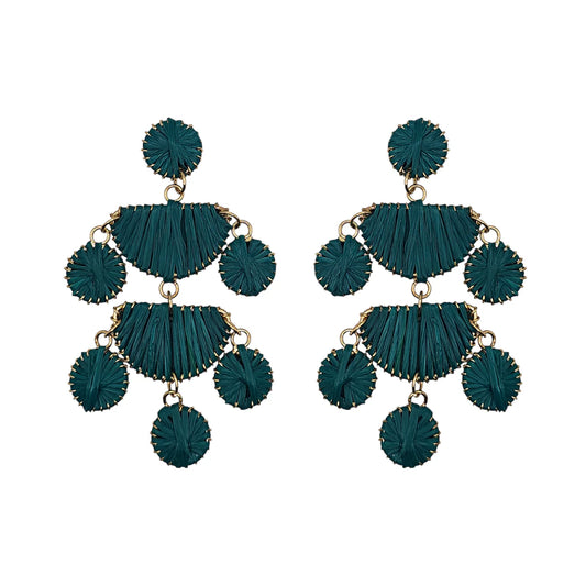 A pair of teal woven raffia chandelier earrings with gold accents, arranged in a tiered, geometric design that showcases bohemian elegance and a lightweight construction for effortless style.