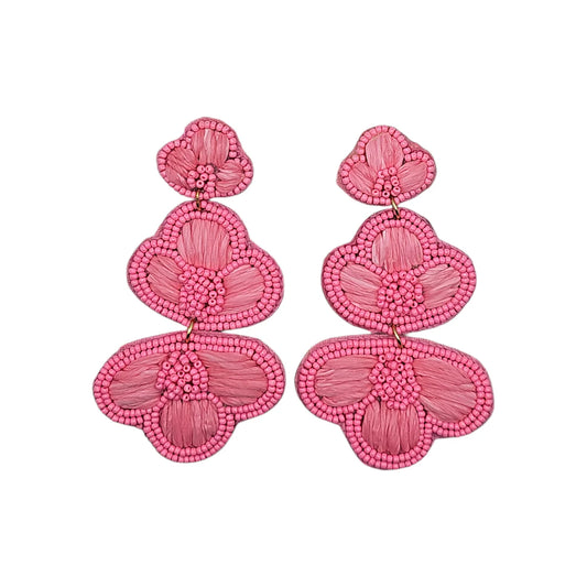 Pair of Carnation Pink Earrings featuring flower-shaped beads with three layered petals, detailed textures, and small central beads—an ideal statement piece of jewellery for any occasion.
