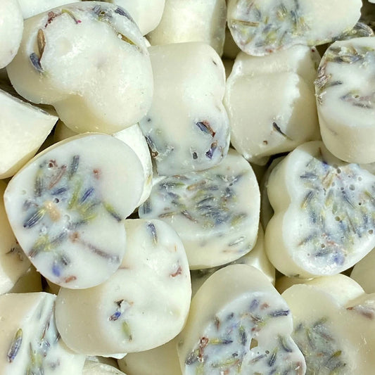 Lavender soya wax melt crafted from eco-friendly wax, featuring heart-shaped designs with embedded lavender buds and infused with essential oils.