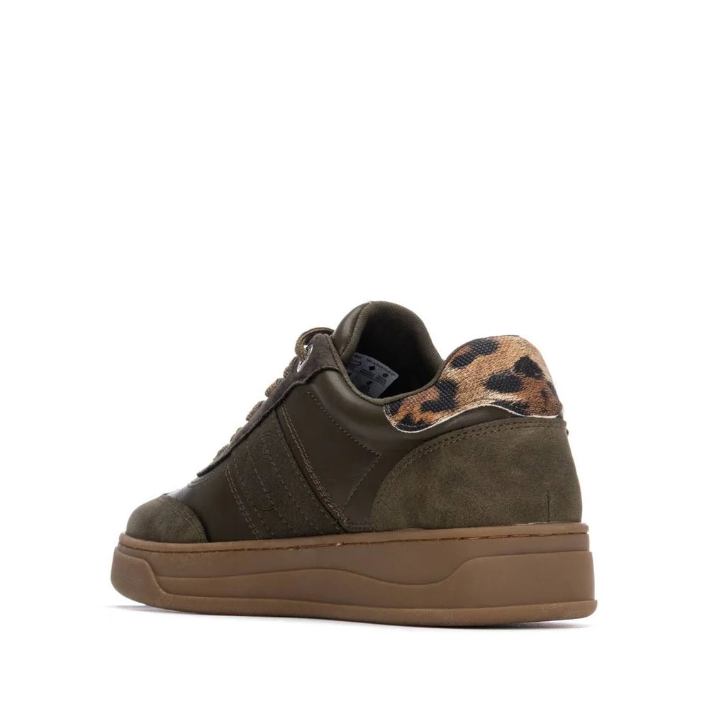 A brown trainer with a tan non-slip rubber sole, olive green suede accents, and a leopard print detail on the heel, seen from the rear side.