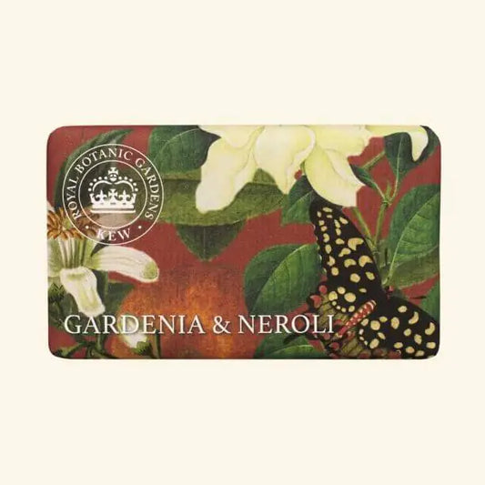 Rectangular vegan soap bar featuring botanical artwork of gardenia blooms, green leaves, and a black butterfly. The label states Royal Botanic Gardens Kew and Gardenia and Neroli Soap. Includes plastic-free packaging.
