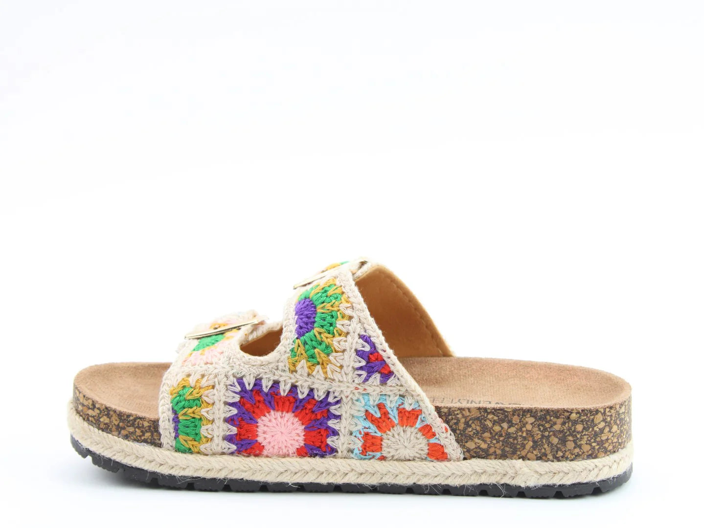 Single vegan-friendly bio-sandal with a cork sole, contoured footbed, and colourful crochet upper featuring geometric patterns, displayed on a white background.