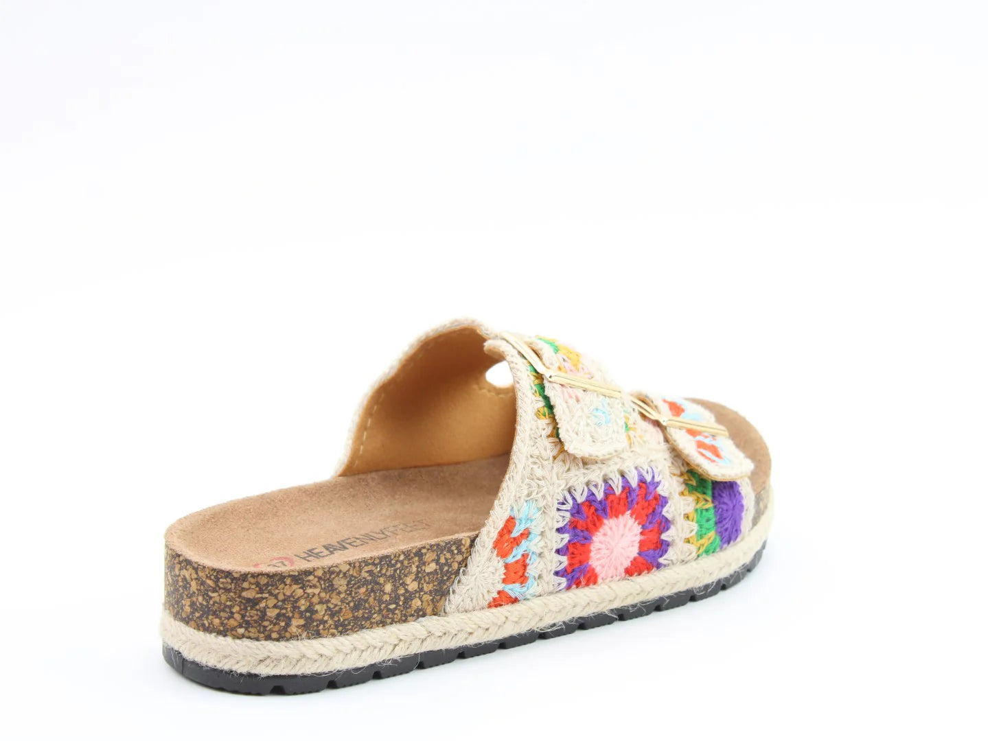 A single vegan-friendly bio-sandal with a cork sole, multicoloured crocheted strap, and contoured footbed is shown against a white background.