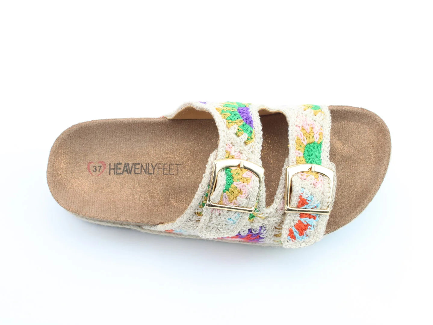 A single vegan-friendly bio-sandal featuring a cork sole, adjustable twin buckles on two crocheted multicoloured straps, and the brand Heavenly Feet printed on the contoured footbed.