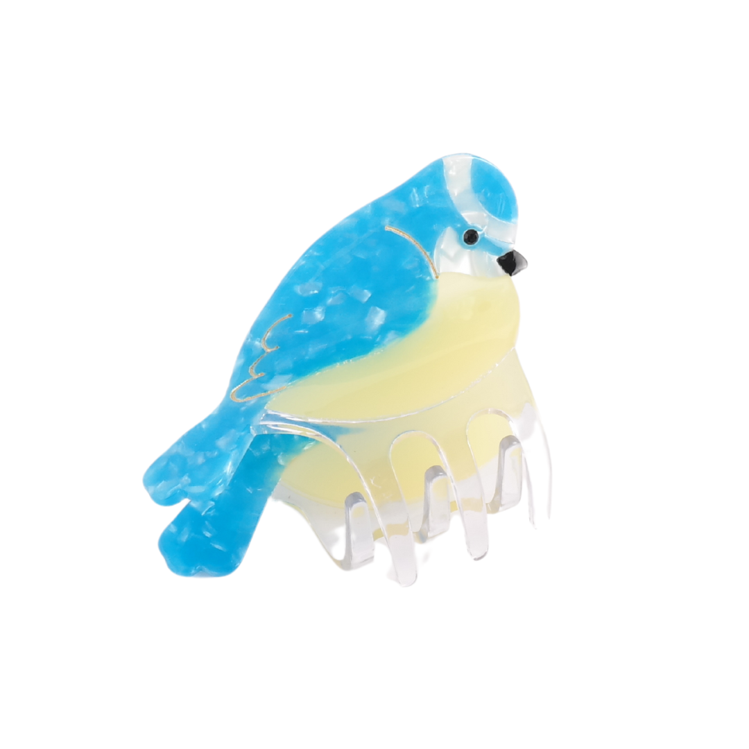 This stylish hair clip, designed as a blue and yellow bird perched on a clear comb base, is both charming and durable—a perfect hair accessory for any occasion.