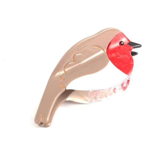 Introducing the stylish Robin Hair Claw Clip: a compact hair accessory shaped like a bird with a beige body and red face, featuring a transparent clamp mechanism.