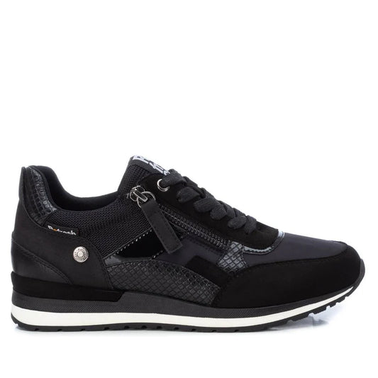 Black athletic trainer with laces, side zip, textured panels, white-accented sole, and a removable insole—these women’s vegan trainers are PETA-certified. Shown side-on against a white background.