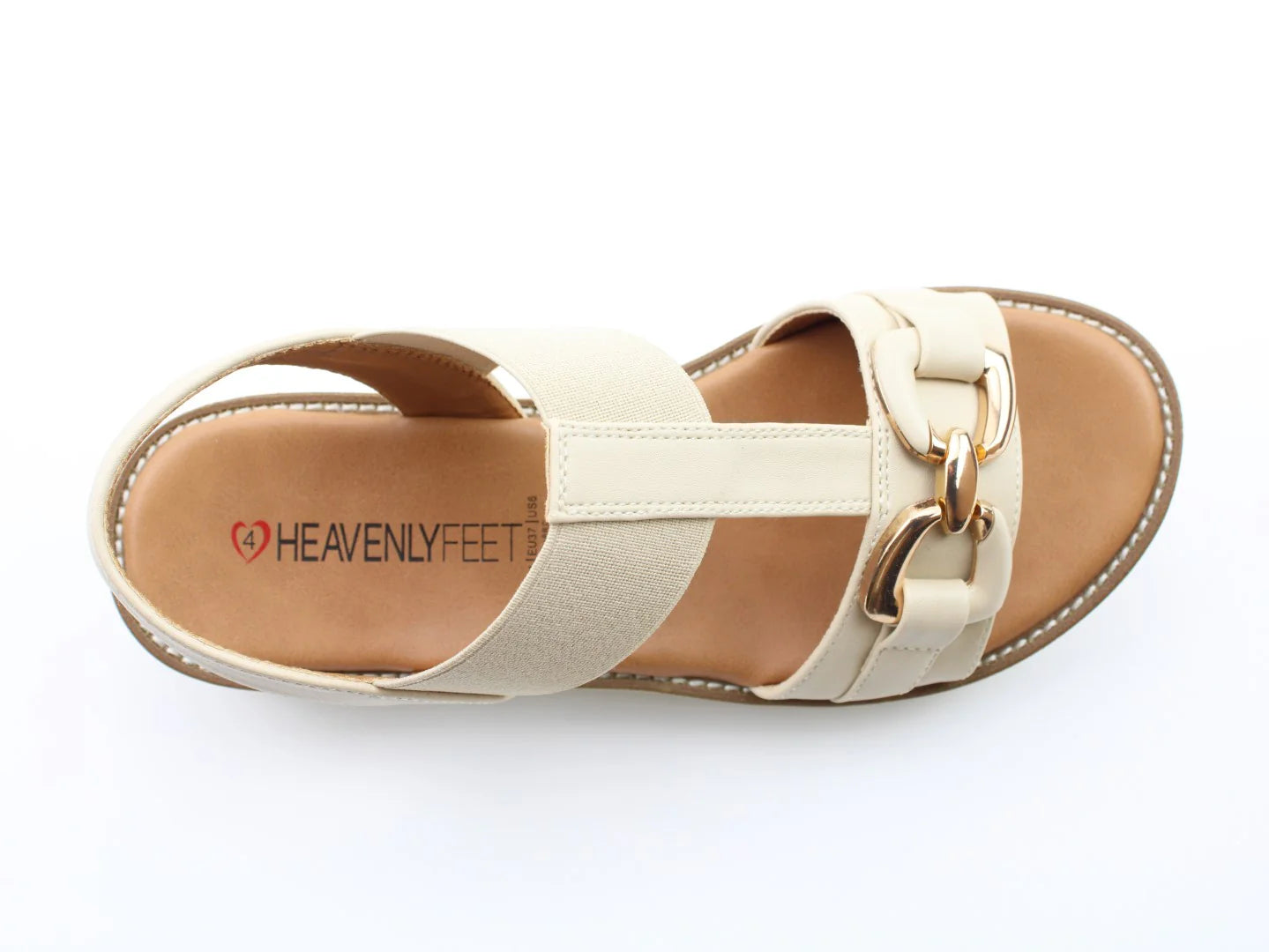 The Lulu2 Sandals feature beige elasticated straps and gold decorative rings, displaying the Heavenly Feet branding on the insole. These vegan-friendly sandals also include Litesoles for extra comfort.