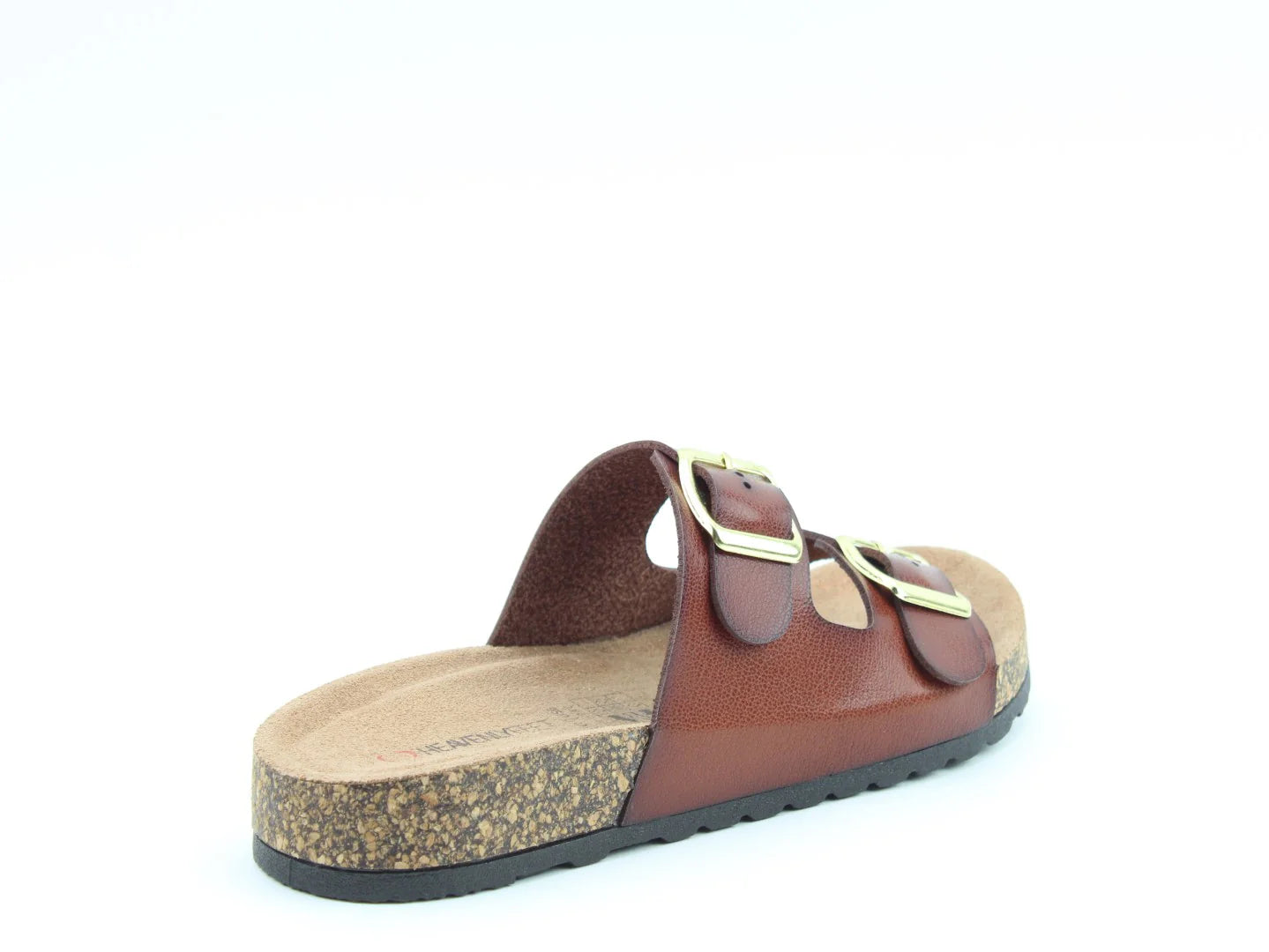 The Harmony2 Sandal features a brown leather appearance with two gold buckles, an open toe design, and a comfortable cork sole. This vegan-friendly premium sandal offers both style and sustainability against a pristine white background.
