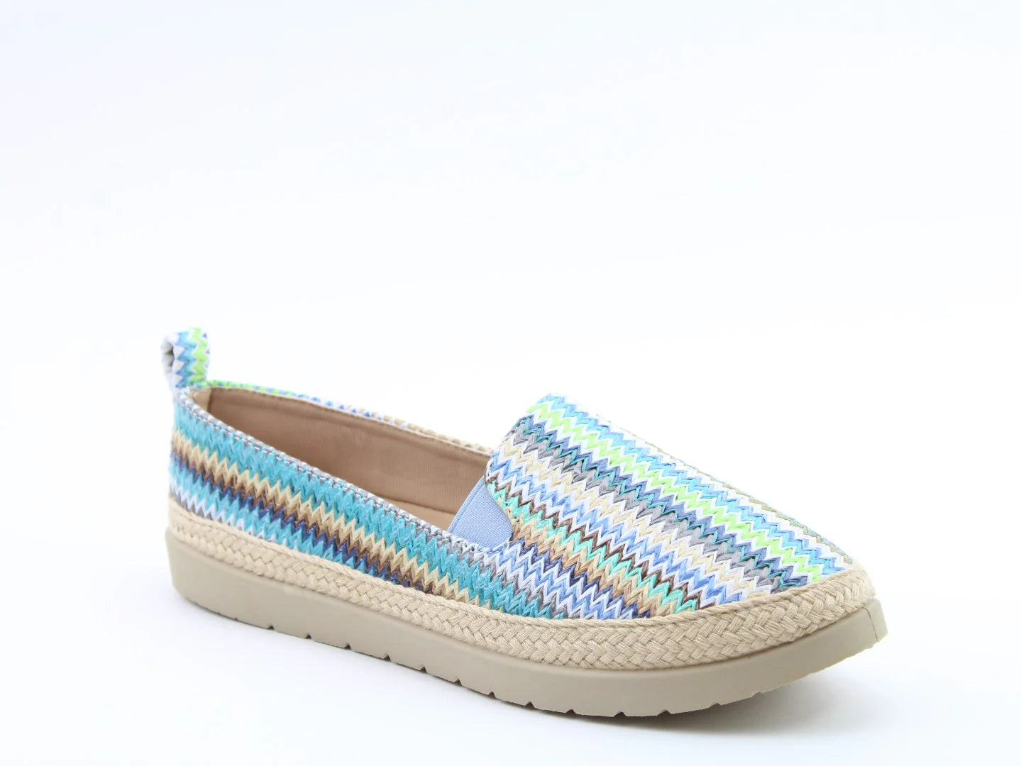 Gracie Blue multicoloured espadrille shoe with a zigzag pattern and beige woven sole. This vegan-friendly design features a convenient pull-tab, isolated on a white background.