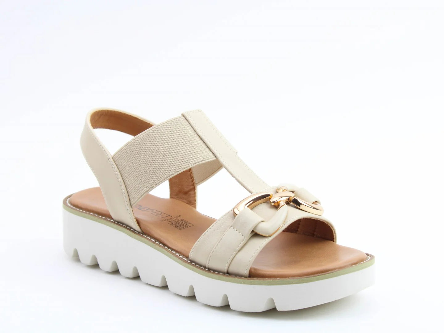The Lulu2 Sandals blend a beige design with a thick white platform sole, open toe, and elastic straps. Featuring a gold buckle detail on the front strap, they are crafted from vegan-friendly materials and lightweight Litesoles for enhanced comfort.