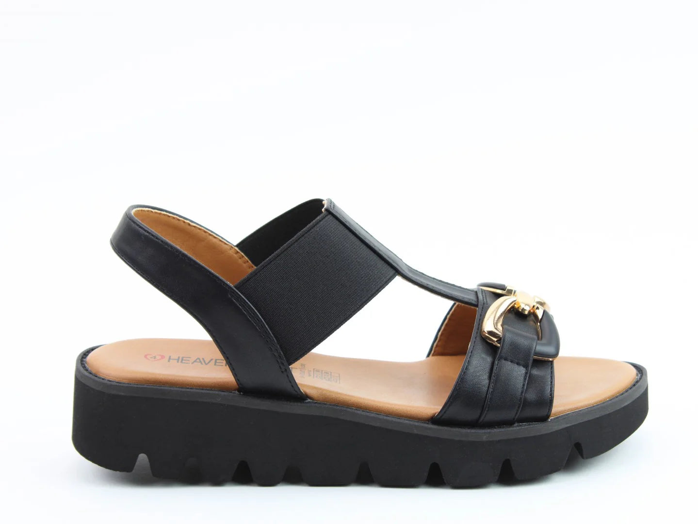 The Lulu2 Sandals are black with a thick sole, featuring straps and gold buckle detailing. They boast Litesoles technology for added comfort and are vegan-friendly for the conscientious shopper.