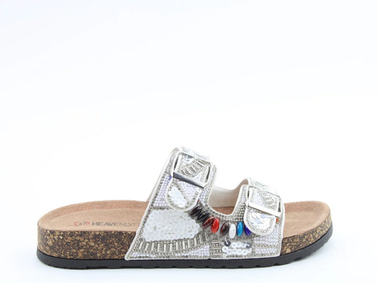 A silver two-strap sandal crafted from vegan-friendly materials, featuring decorative beads and sequins on the upper, a cork footbed, and a black rubber sole—perfect for your summer look.