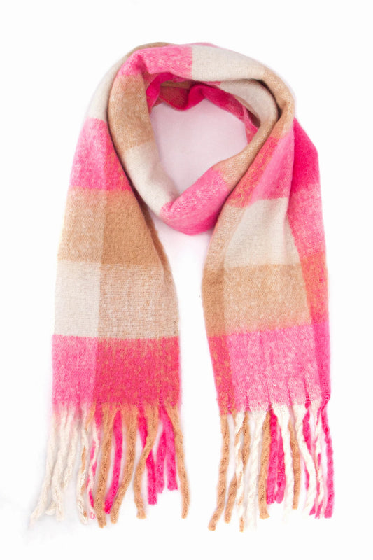 A heavyweight pink checked scarf featuring a large plaid pattern in shades of pink, beige, and cream, finished with fringed ends and shown against a white background.