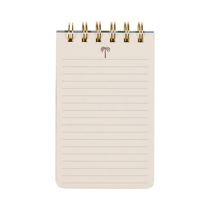 A small spiral-bound tropical notepad with lined pages and a little palm tree illustration at the top—ideal for enthusiasts of elegant stationery.