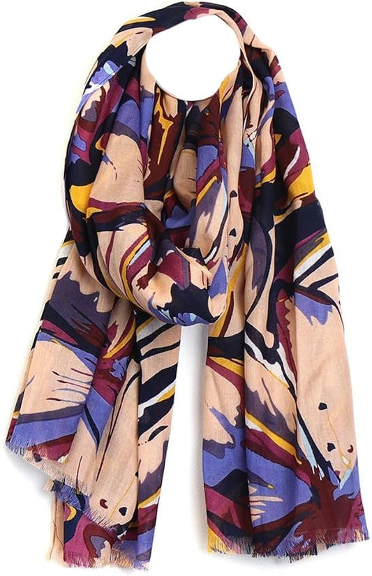 A lightweight accessory, this multicoloured scarf displays an abstract floral pattern in purple, beige, yellow and maroon with frayed edges—ideal as a summer scarf or a vegan-friendly option.