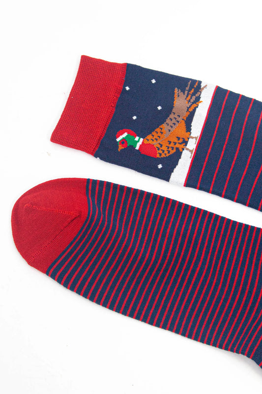 Two socks: one with red and navy stripes, the other with a festive pheasant print wearing a Santa hat and snow on navy. Add charm to your ensemble with these Men’s Pheasant Vegan Socks.