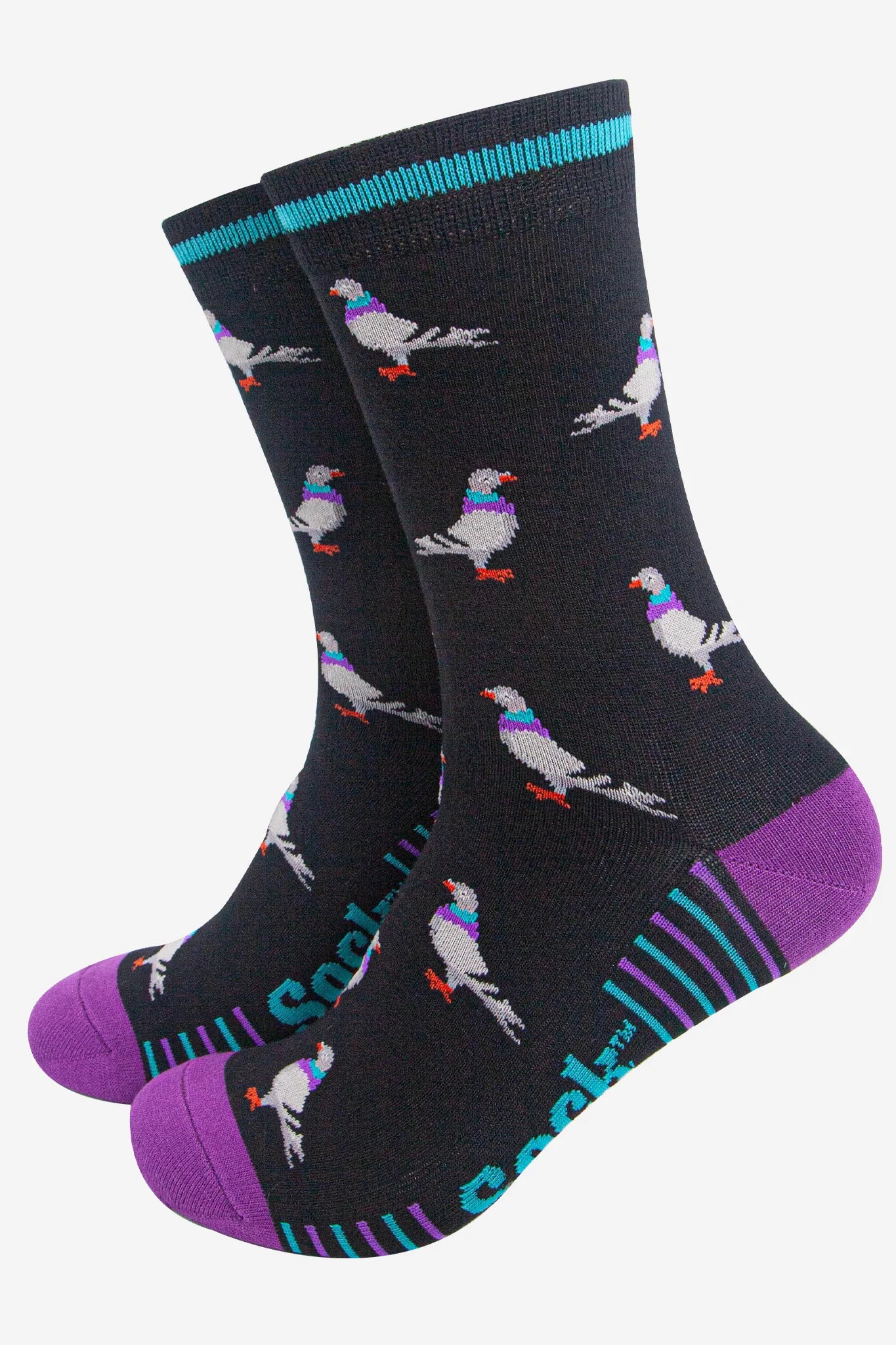 A pair of black bamboo socks featuring a pigeon pattern, purple toes and heels, turquoise trim, and striped detailing near the sole.