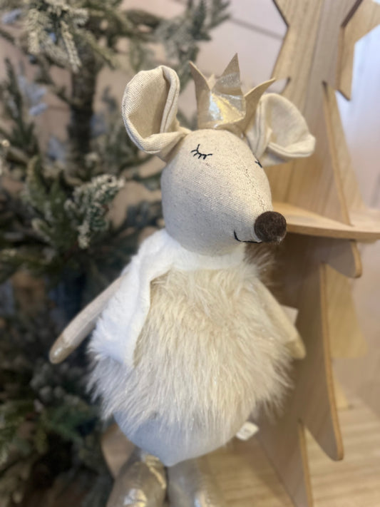 Standing Christmas Mouse wearing a gold crown and fluffy white outfit, ideal as a festive decoration set before a wooden tree and green, frosted pine backdrop.
