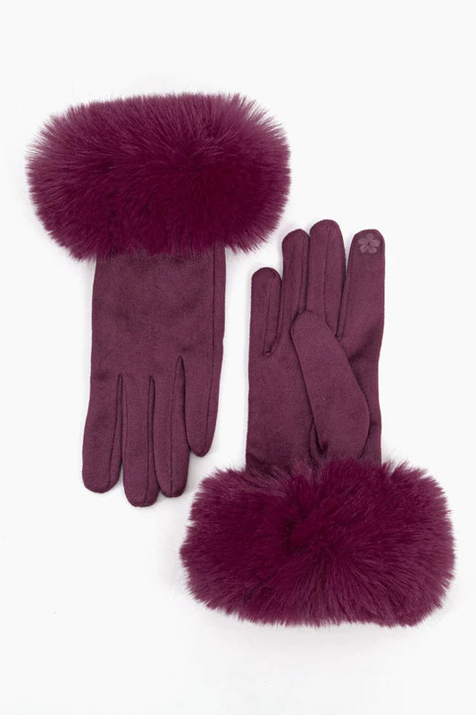 A pair of berry-coloured gloves with animal-friendly vegan faux fur trim at the wrists, displayed against a white background.