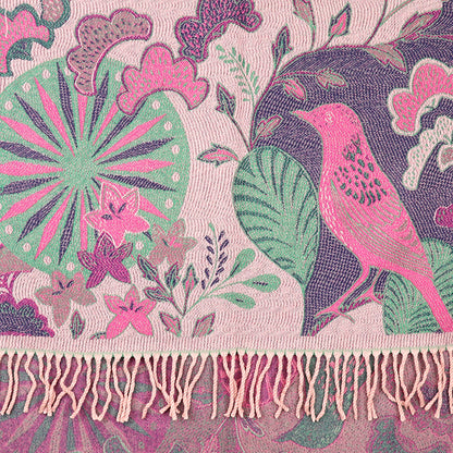 Textile pattern featuring a pink bird and vibrant floral motifs, this luxurious jacquard scarf boasts reversible sides and fringed edges, creating an elegant garden-inspired accessory.