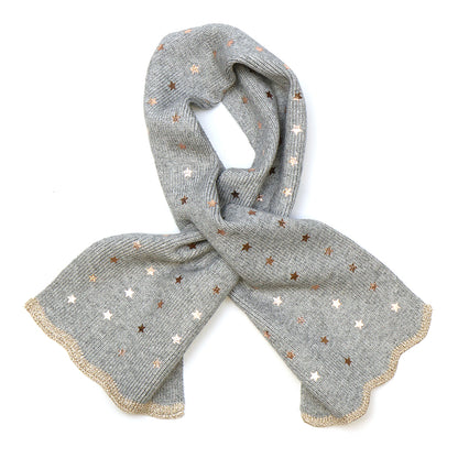 A light grey recycled-blend scarf featuring metallic star patterns and a scalloped gold trim, displayed flat against a white background.