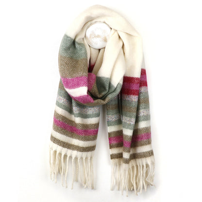 A twill-knit striped scarf featuring cream, green, olive, and pink stripes with fringed ends, shown hanging against a white background.