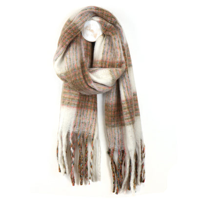 A beige chunky checked scarf featuring a tartan pattern in muted tones and fringed ends; this cosy accessory is shown against a white background.