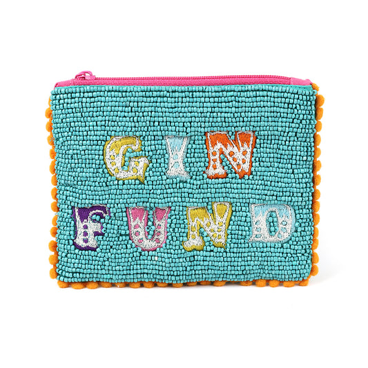 Small aqua beaded purse with a blue and orange design featuring the GIN FUND motif in textured letters. Adorned with an orange pom-pom trim and a pink zip on top, its both playful and functional.